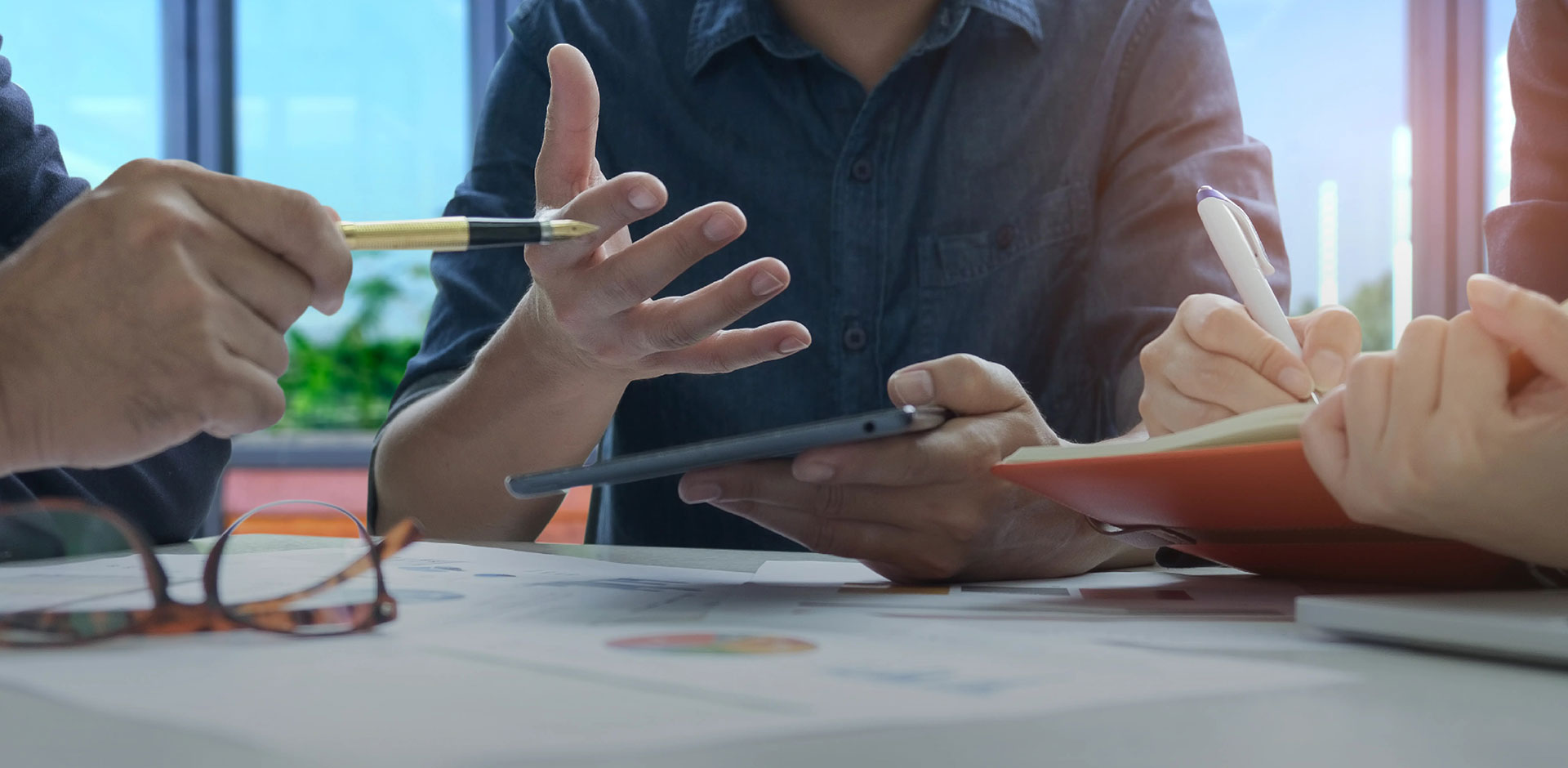 Team members are discussing in a meeting